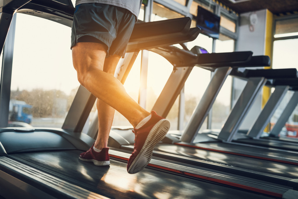 man running in treadmill